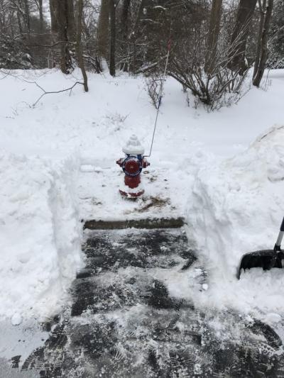 Snow around fire hydrant